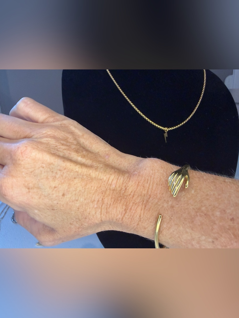 Gold Tone Fashion Hand Bracelet & Stainless Steel Lightening Bolt Necklace Set